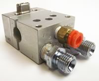 Delta mounting manifold with bottom fluid entry ports